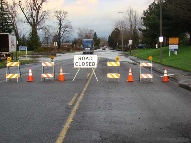 Do not ever drive around Road Closed signs. They are there for your safety.