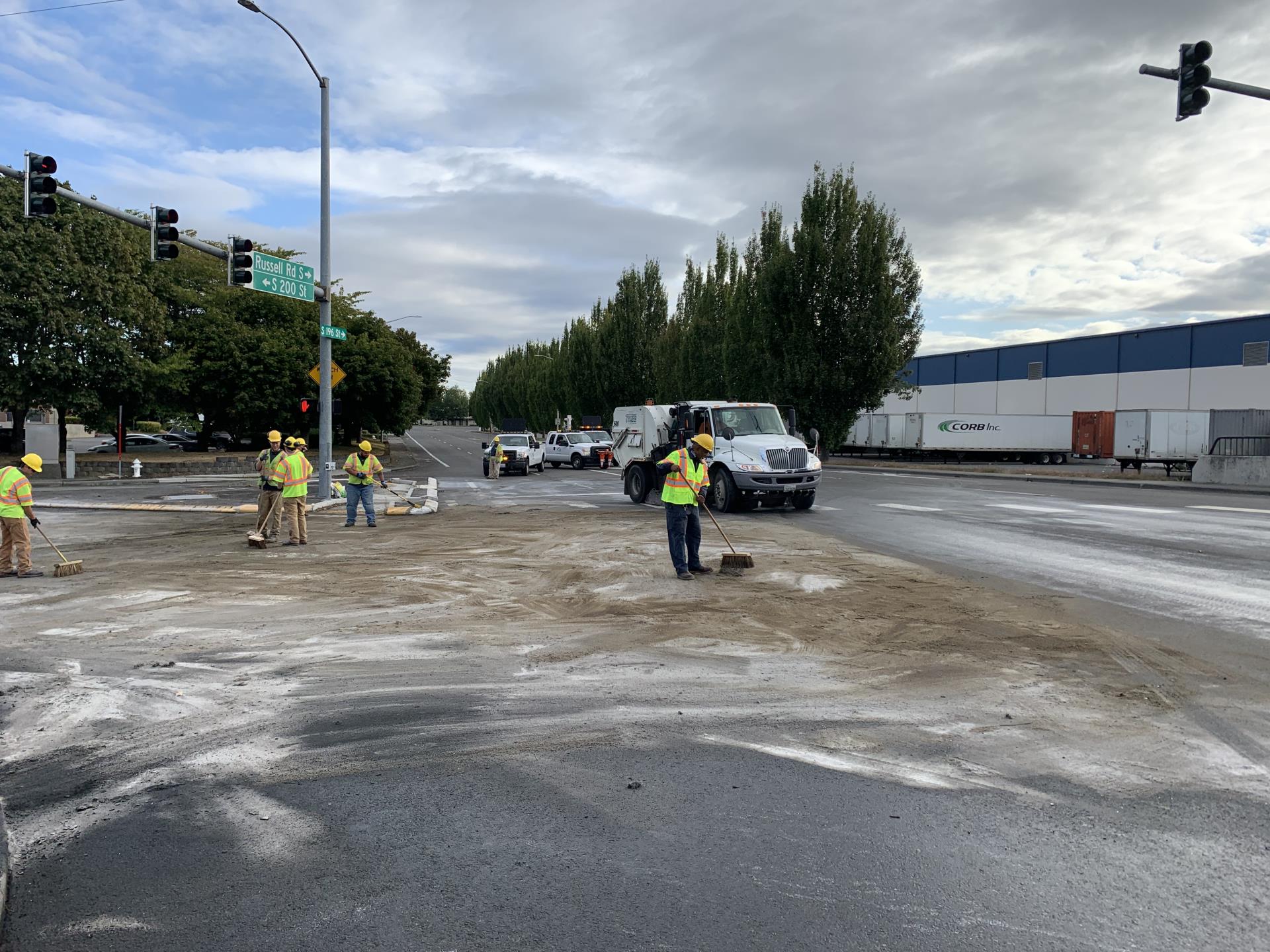 Staff cleaning up spill