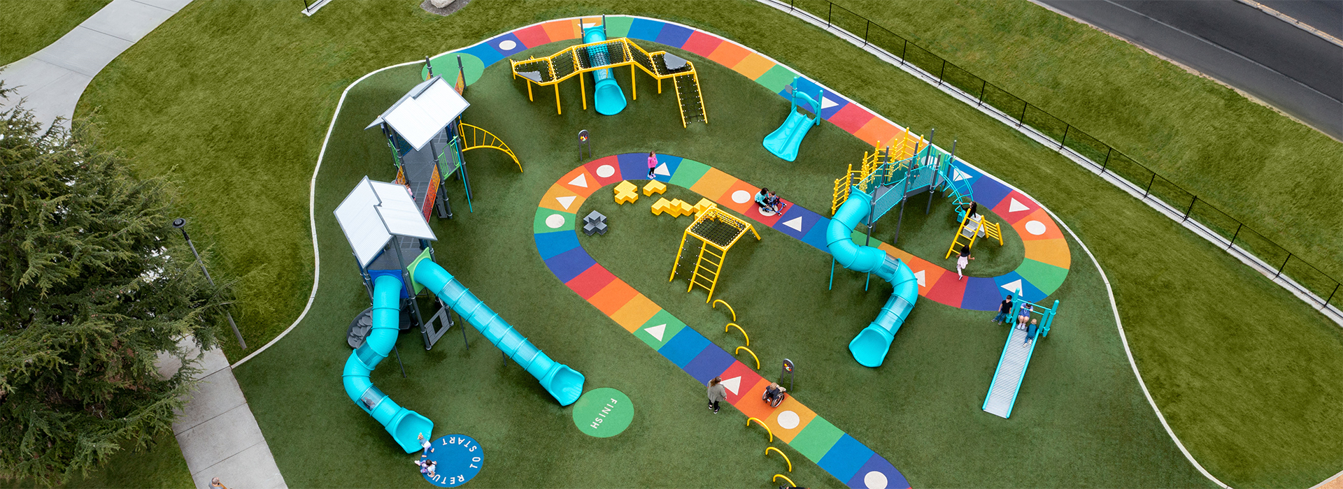 An aerial shot of the winding multi-colored path of West Fenwick Park