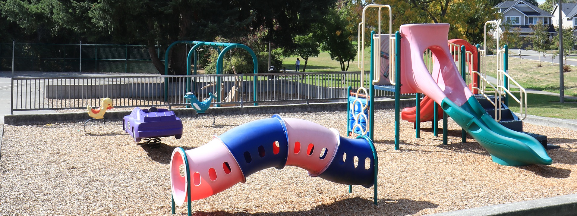 play structures and swings in a park