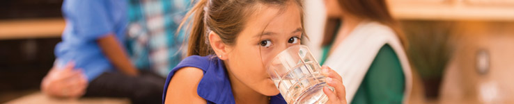 Water Quality Banner with small girl drinking water