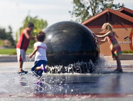 Town Square Plaza kids and floating sphere